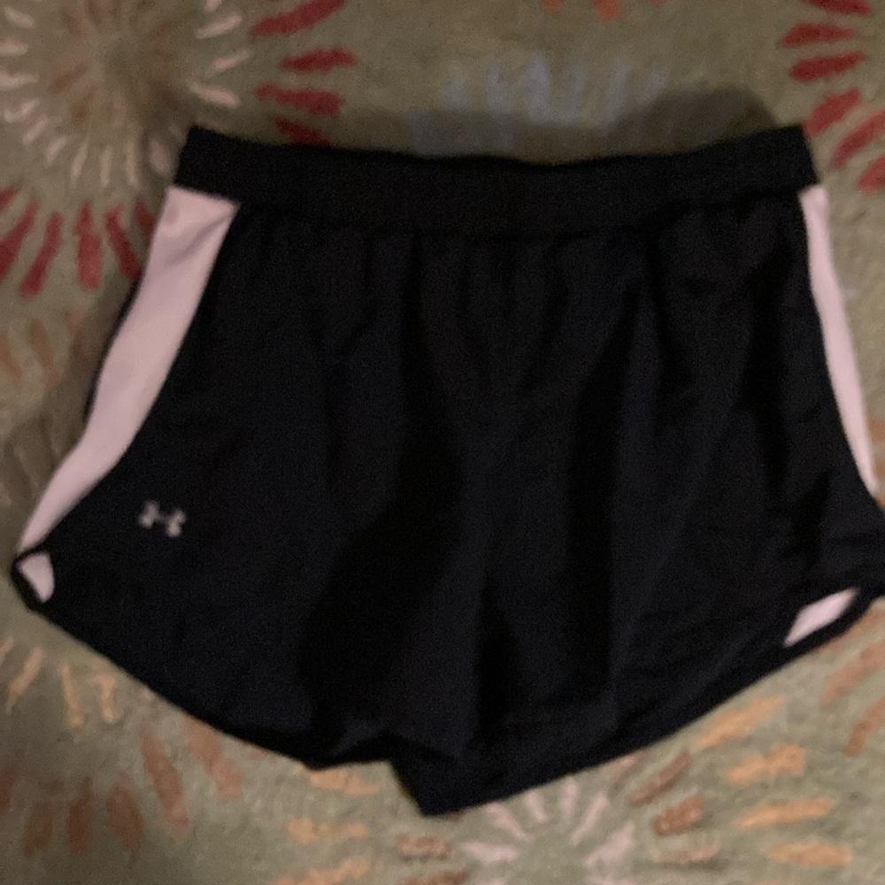 Under armor activewear shorts with built in underwear. Stretchy waist with ties
